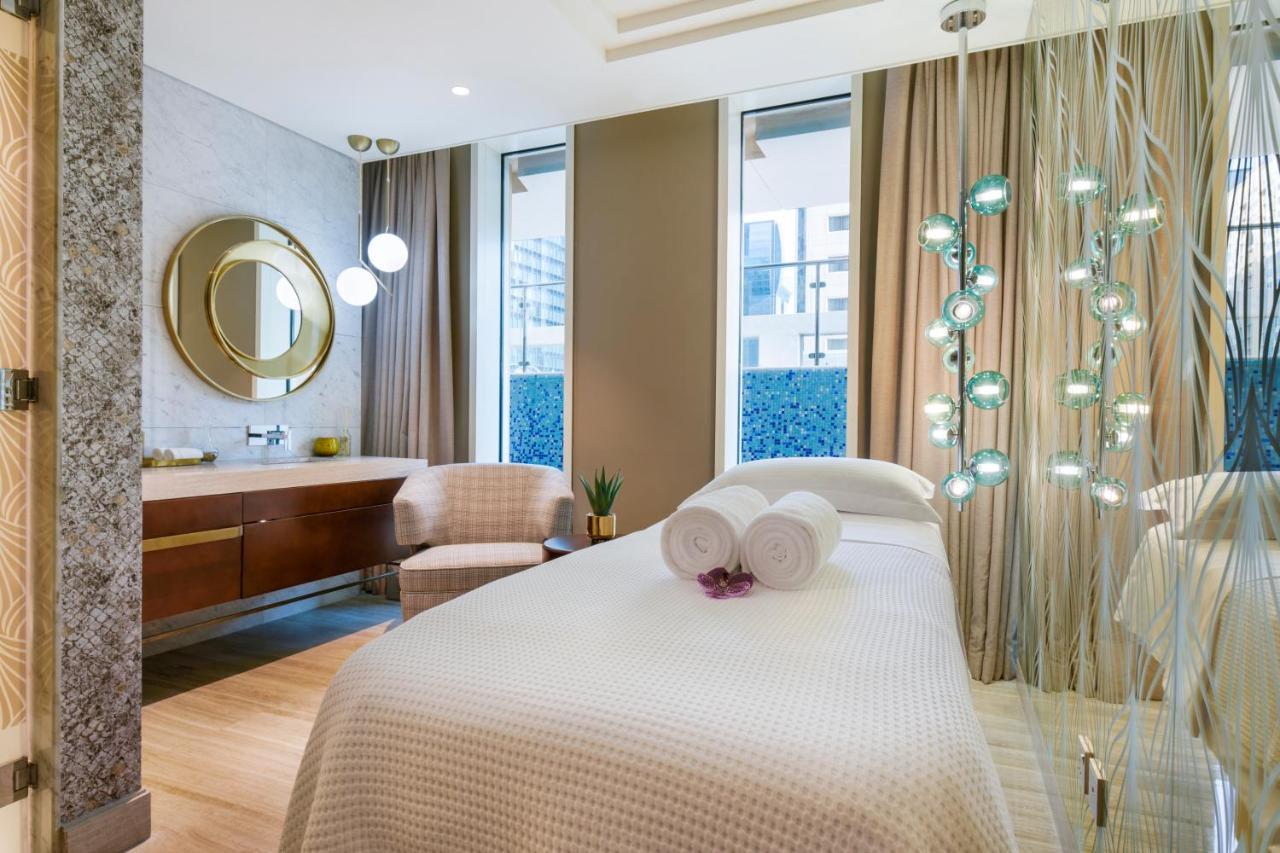 Wyndham Grand Doha West Bay Beach Exterior foto The Spa at The Westin