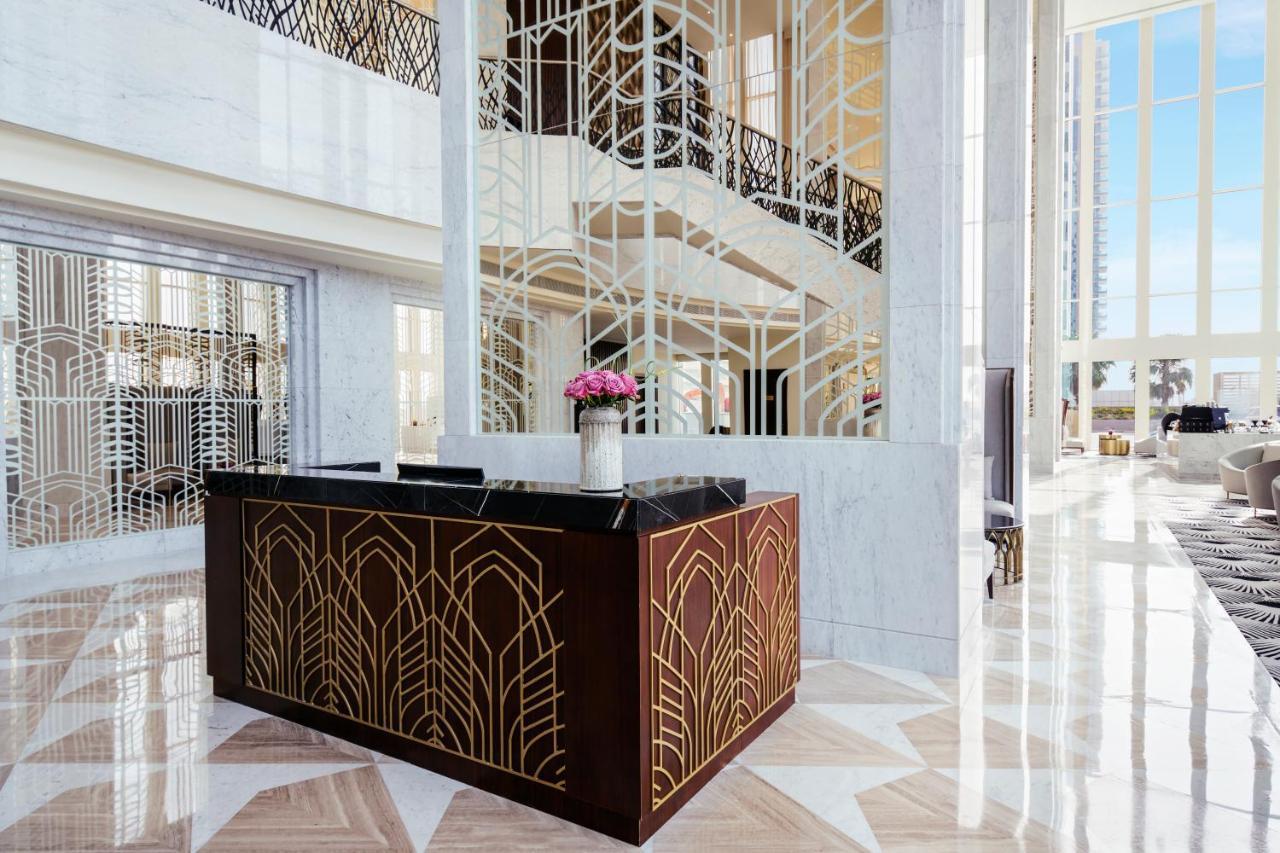 Wyndham Grand Doha West Bay Beach Exterior foto The lobby of the hotel