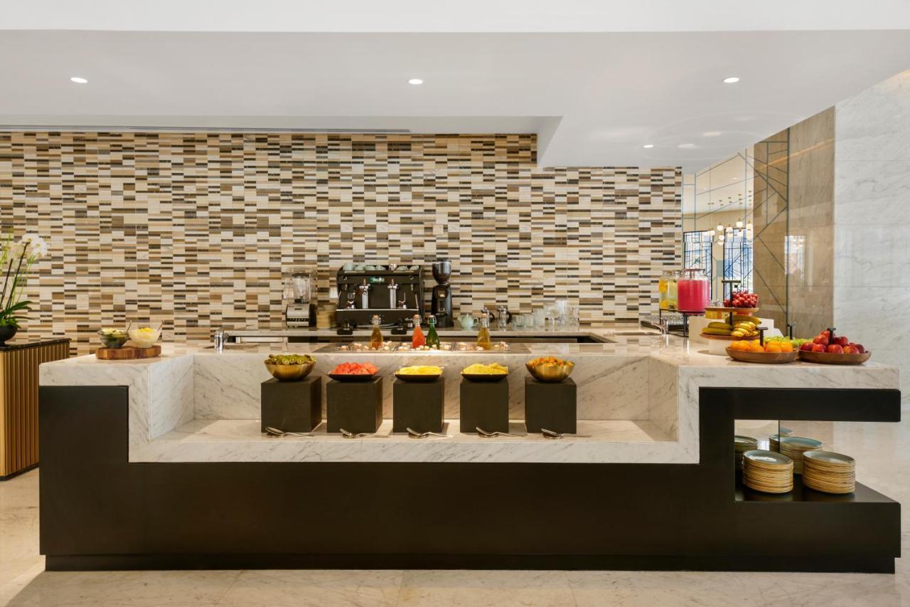Wyndham Grand Doha West Bay Beach Exterior foto The Coffee Shop