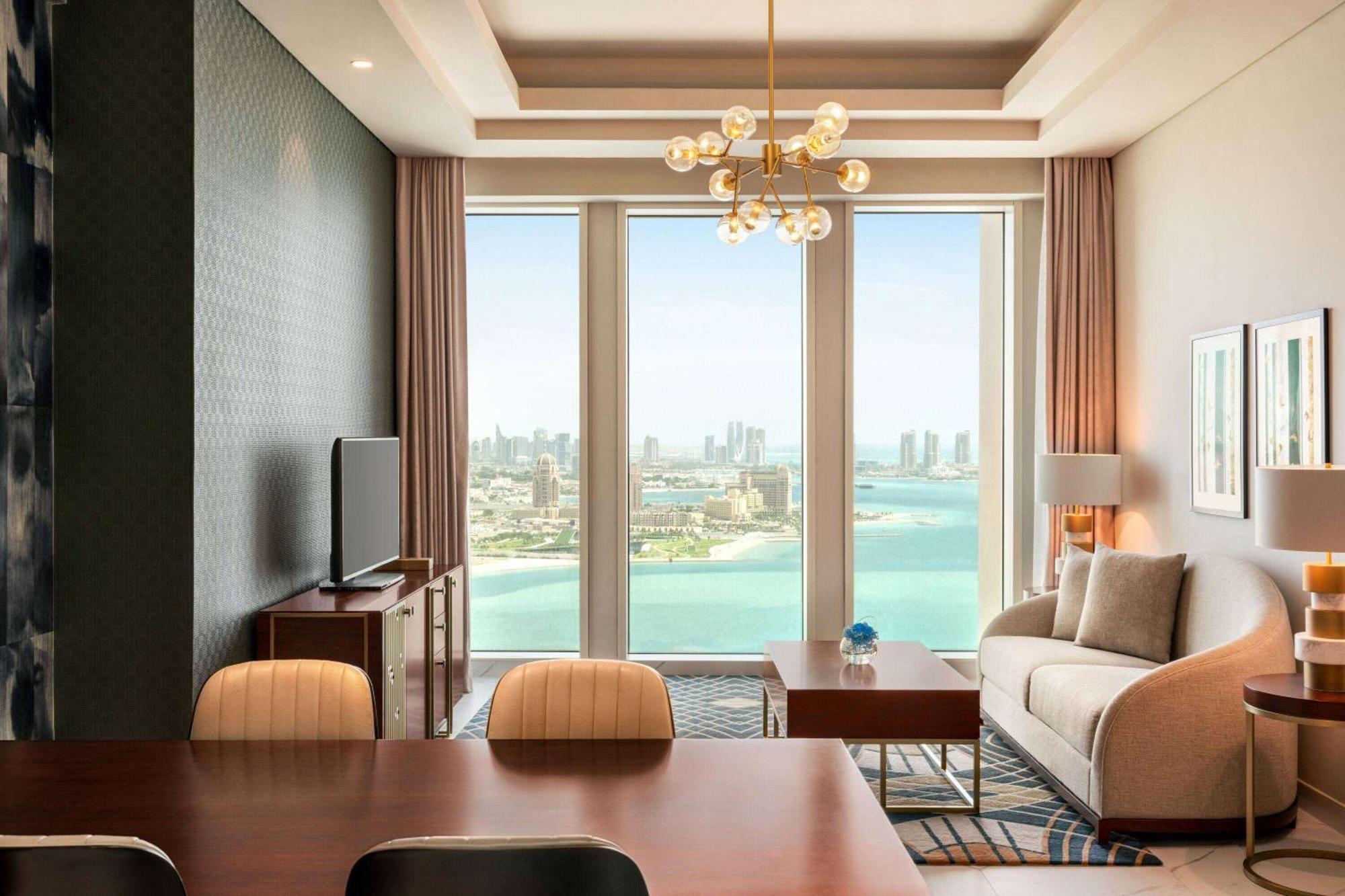 Wyndham Grand Doha West Bay Beach Exterior foto A living room at the hotel